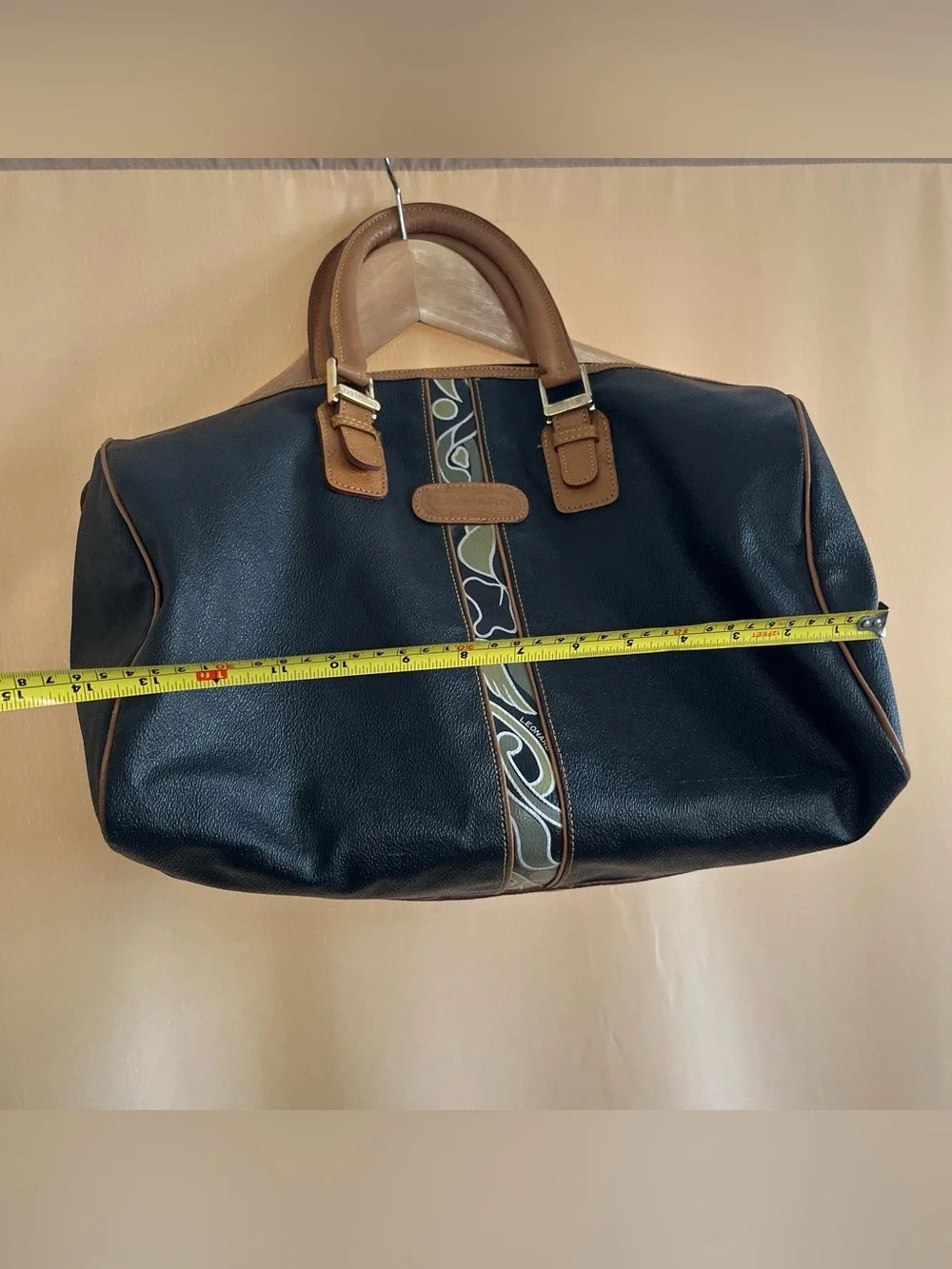 Black Leather Duffel Bag with Brown Trim and Olive Pattern Accent